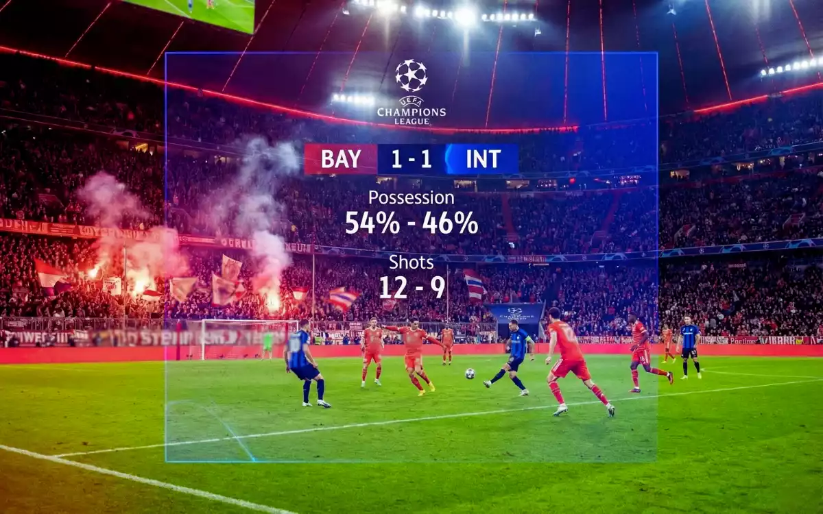 Partido de fútbol de Champions League con estadísticas superpuestas en la pantalla